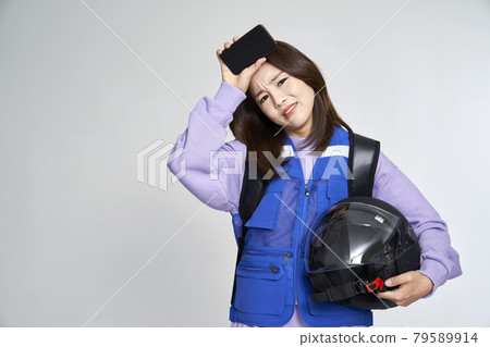 delivery, deliveryman, shipping, courier, deliveryman, helmet, young woman, nukki, gray background delivery, deliveryman, shipping, courier, deliveryman, helmet, young woman, nukki, gray background 79589914