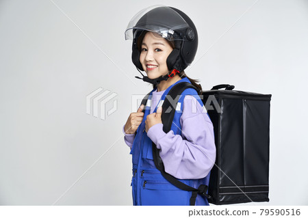 delivery, deliveryman, shipping, courier, deliveryman, helmet, young woman, nukki, gray background delivery, deliveryman, shipping, courier, deliveryman, helmet, young woman, nukki, gray background 79590516