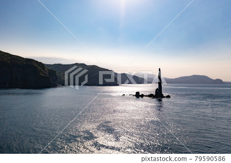 Drone aerial view Candle rock and emerald green sea Sightseeing image of Yoichi, Hokkaido 79590586