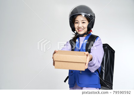 delivery, deliveryman, shipping, courier, deliveryman, helmet, young woman, nukki, gray background delivery, deliveryman, shipping, courier, deliveryman, helmet, young woman, nukki, gray background 79590592