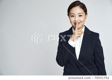 Business woman, career woman, business, suit, nude, gray background Business woman, career woman, business, suit, nude, gray background 79591762