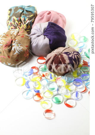 Old beanbags and bags made from kimono fabric, white background 79595307