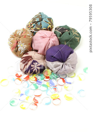 Old beanbags and bags made from kimono fabric, white background 79595308