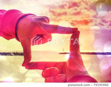Finger frame, focused view of stony pier in bay. Walk along sea 79595998