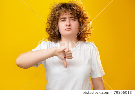 dislike gesture obesity shaming overweight woman dislike gesture obesity shaming overweight woman 79596018