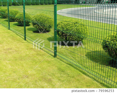 neat fence around the private area in the city neat fence around the private area in the city 79596253