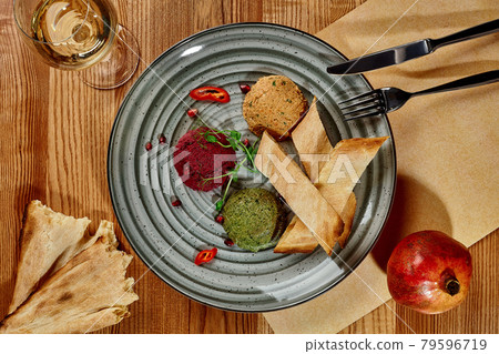 Georgian Pkhali with spinach, beetroot and white beans 79596719