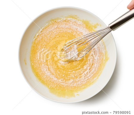 bowl of mixed egg yolks and sugar with corn starch bowl of mixed egg yolks and sugar with corn starch 79598091