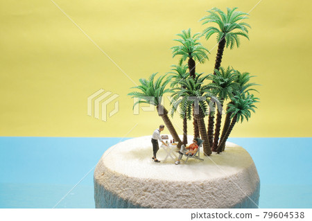 a Mini Tourist sitting in a deck chair on Young coconut 79604538