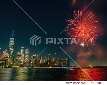 Fireworks celebration of July 4th with the famous Manhattan skyline 79609830