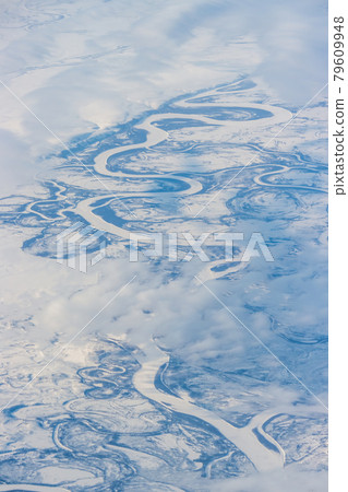 Aerial view of a meandering river in the tundra Aerial view of a meandering river in the tundra 79609948