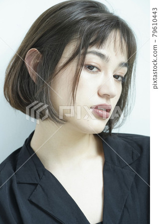 Woman with casual hairstyle Woman with casual hairstyle 79610443