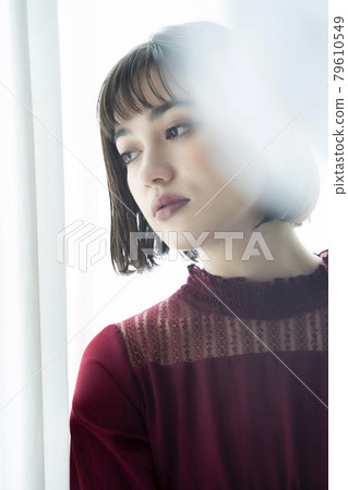 Portrait of dressed up woman 79610549