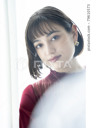 Portrait of dressed up woman 79610573