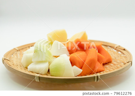Carrots, potatoes, onions cut for curry Carrots, potatoes, onions cut for curry 79612276