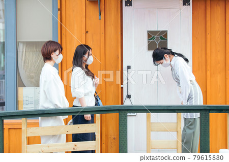 Entering the store in Corona 79615880