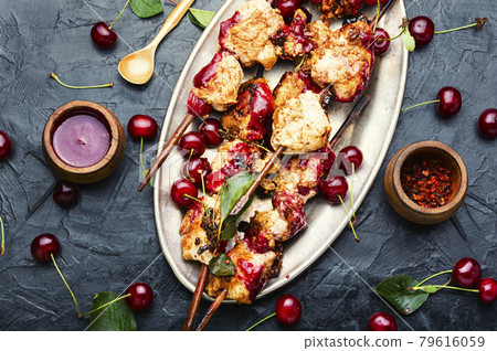 Chicken skewers in cherry marinade Chicken skewers in cherry marinade 79616059
