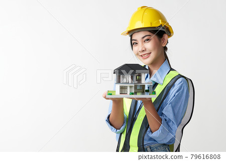 beautiful young asian woman engineer holding showing house model on white background, beautiful young asian woman engineer holding showing house model on white background, 79616808