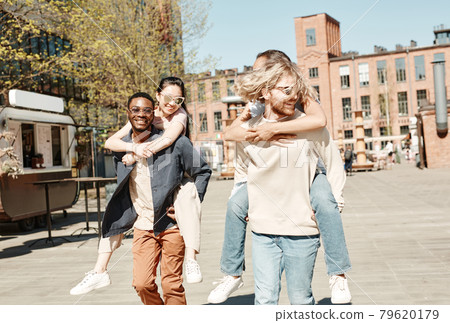 Young Couples in Summer City Young Couples in Summer City 79620179