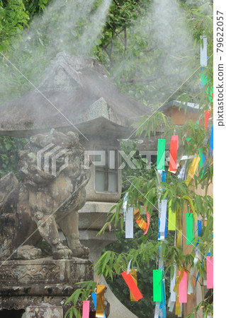 A strip of guardian dogs and Tanabata festival with summer mist at Kitano Tenmangu, Kyoto A strip of guardian dogs and Tanabata festival with summer mist at Kitano Tenmangu, Kyoto 79622057
