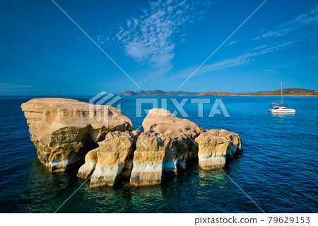Yacht boat at Sarakiniko Beach in Aegean sea, Milos island , Greece 79629153