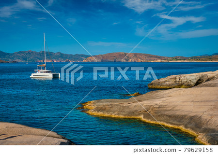 Yacht boat at Sarakiniko Beach in Aegean sea, Milos island , Greece 79629158
