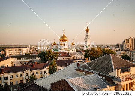 view from the rooftop to the evening city and the Orthodox Church.  view from the rooftop to the evening city and the Orthodox Church.  79631322
