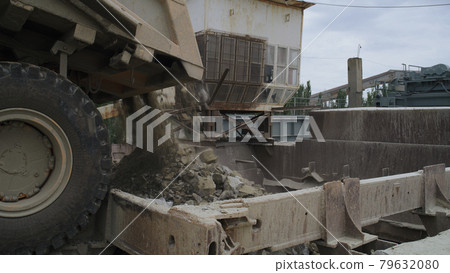 Truck unloading stone rubble on quarry Truck unloading stone rubble on quarry 79632080