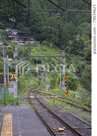 Railroad scenery Points and railroad crossings Disappearing railroad tracks in the mountains Tokyo railroad Ome line single track section 79634625