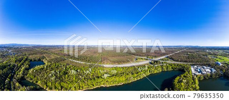 Aerial view over Oberwaldsee recreation area close to Frankfurt in Germany 79635350