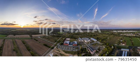 Aerial view over the city of Walldorf close to Frankfurt in Germany at evening time Aerial view over the city of Walldorf close to Frankfurt in Germany at evening time 79635450