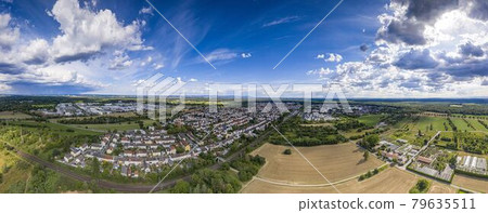 Aerial panoramic picture of the city Moerfelden in southern Hesse area during sunset Aerial panoramic picture of the city Moerfelden in southern Hesse area during sunset 79635511
