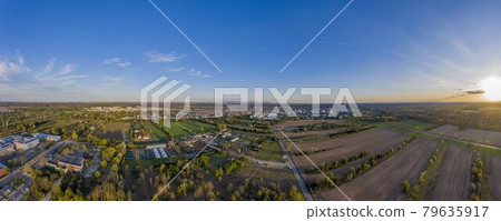 Panoramic drone picture of the city Moerfelden-Walldorf with the skyline of Frankfurt Panoramic drone picture of the city Moerfelden-Walldorf with the skyline of Frankfurt 79635917