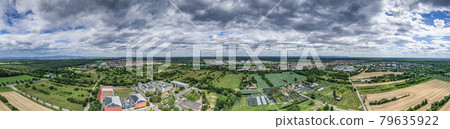 Panoramic drone picture of the city Moerfelden-Walldorf with the skyline of Frankfurt Panoramic drone picture of the city Moerfelden-Walldorf with the skyline of Frankfurt 79635922