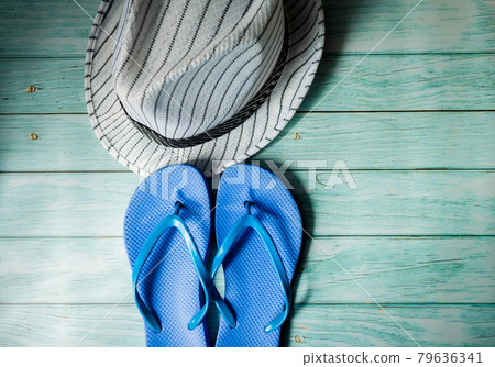 flip-flops and a striped hat flip-flops and a striped hat 79636341