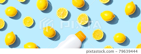 Sunblock bottle with yellow lemons Sunblock bottle with yellow lemons 79639444