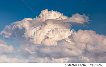Extreme thunderstorm clouds moving over fields, climate change concept 79640266