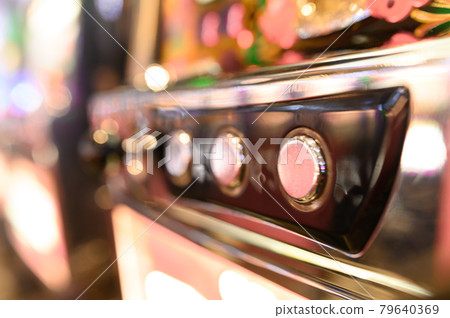 Pachinko slot game machine (out focus) Pachinko slot game machine (out focus) 79640369