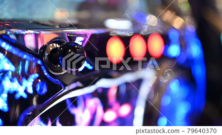 Pachinko slot game machine (out focus) Pachinko slot game machine (out focus) 79640370