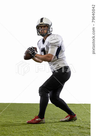 American football player isolated on white studio background. American football player isolated on white studio background. 79640842