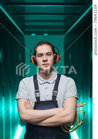 Young Engineer in Server Room 79641184