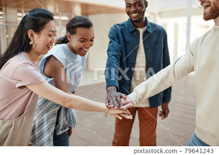 Group of Friends Stacking Hands Outdoors 79641243