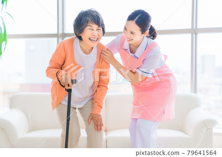 Senior women and long-term care staff in long-term care facilities Senior women and long-term care staff in long-term care facilities 79641564