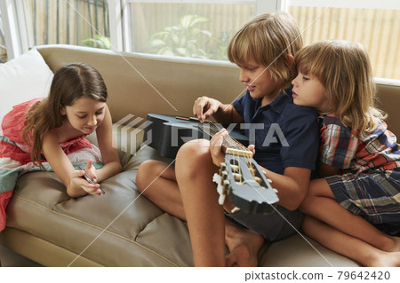 Girl Showing Music Notes Girl Showing Music Notes 79642420