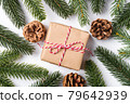 Christmas holidays zero waste paper giftbox wrapping with tag, pine cones and fir branches 79642939