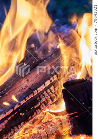 Close-up burning bonfire with coals in the night. Close-up burning bonfire with coals in the night. 79643021
