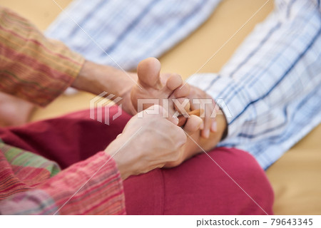 Close up fingers massaging. 79643345