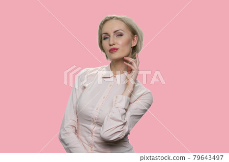 Young beautiful woman trying to seduce someone. 79643497