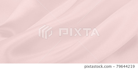 Smooth elegant pink silk or satin texture as wedding background. Luxurious background design Smooth elegant pink silk or satin texture as wedding background. Luxurious background design 79644219