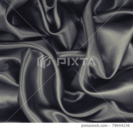 Smooth elegant brown silk or satin texture as abstract background. Luxurious background design. Sepia toned. Retro style Smooth elegant brown silk or satin texture as abstract background. Luxurious background design. Sepia toned. Retro style 79644236